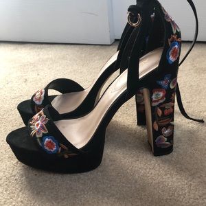 Black floral patterned heels